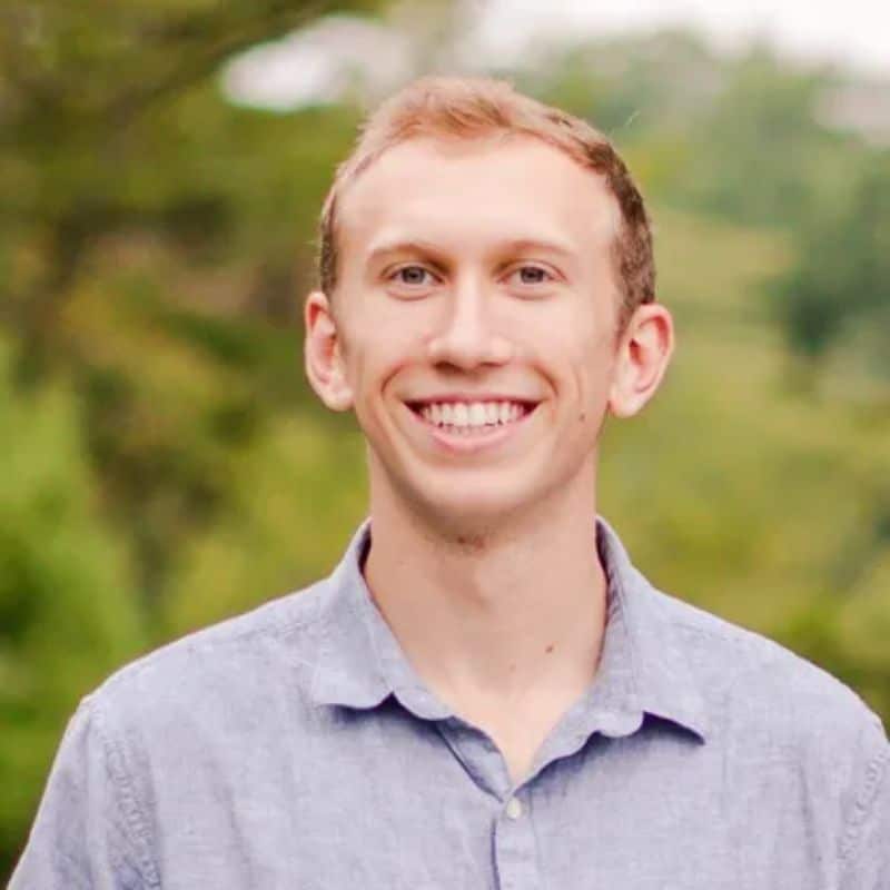 a man smiling for a picture
