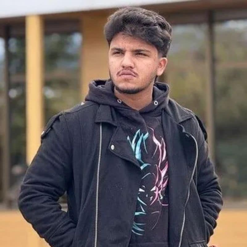 a man in a black jacket