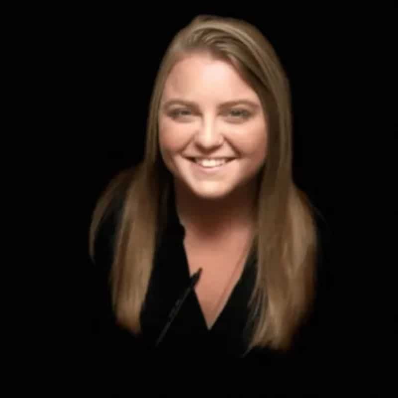 a woman smiling at camera